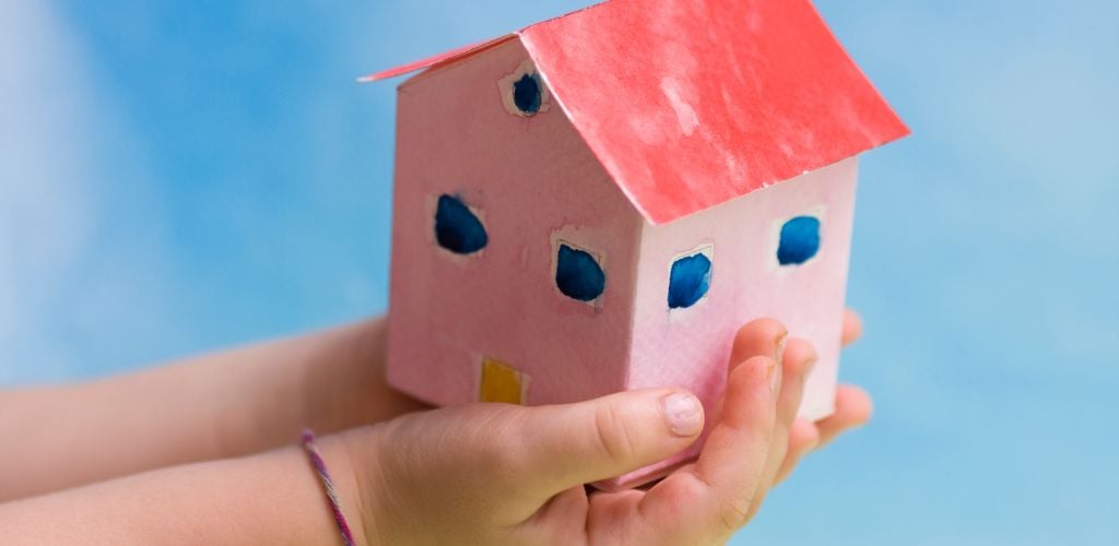 Painted carboard house in a child